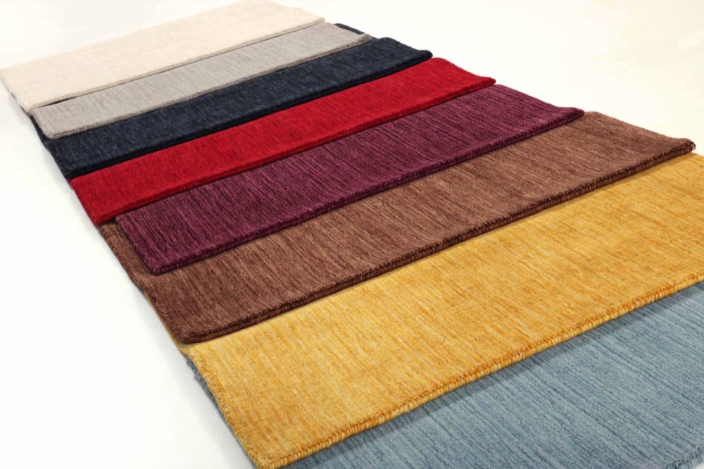 Rezas: Dense virgin wool handloom rugs – unicolour or with gradient