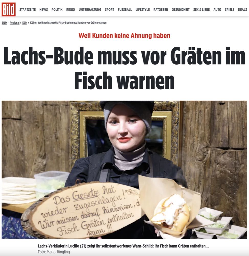 Köln: Flammlachs-Bude warnt vor Gräten