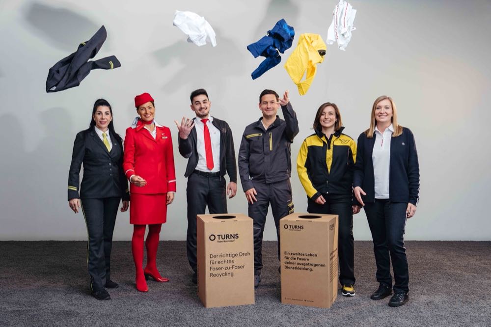 Mitarbeiter von CAT, Austrian Airlines, ÖBB, Salesianer, Österreichischer Post und Wiener Linien freuen sich über die Zusammenarbeit fürs Textilrecycling. Salesianer startet Pilotprojekt fürs Recycling