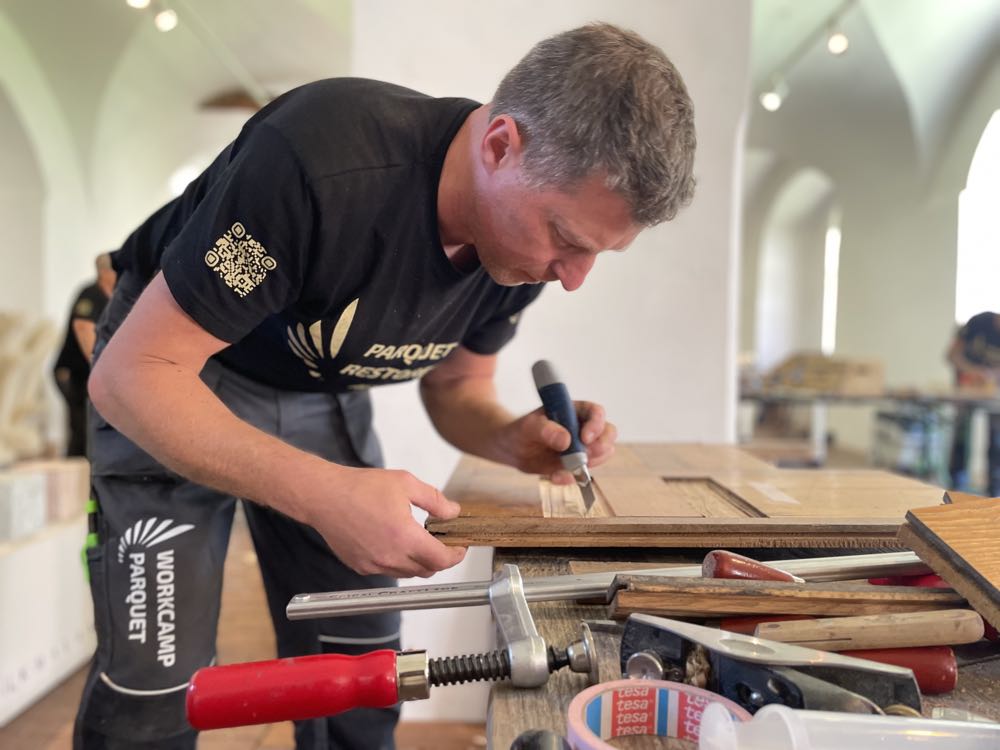  Workcamp Parquet 2025: Eintauchen in alte Techniken der Parkettsanierung